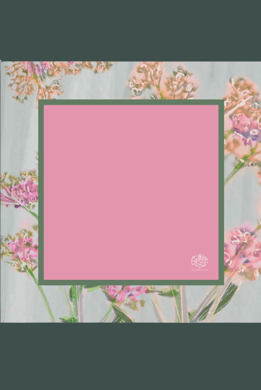 A square pink mahjong mat with a dark green border, centered on a floral background with a dark green outer border. A small white logo is visible in the bottom-right corner of the pink area.