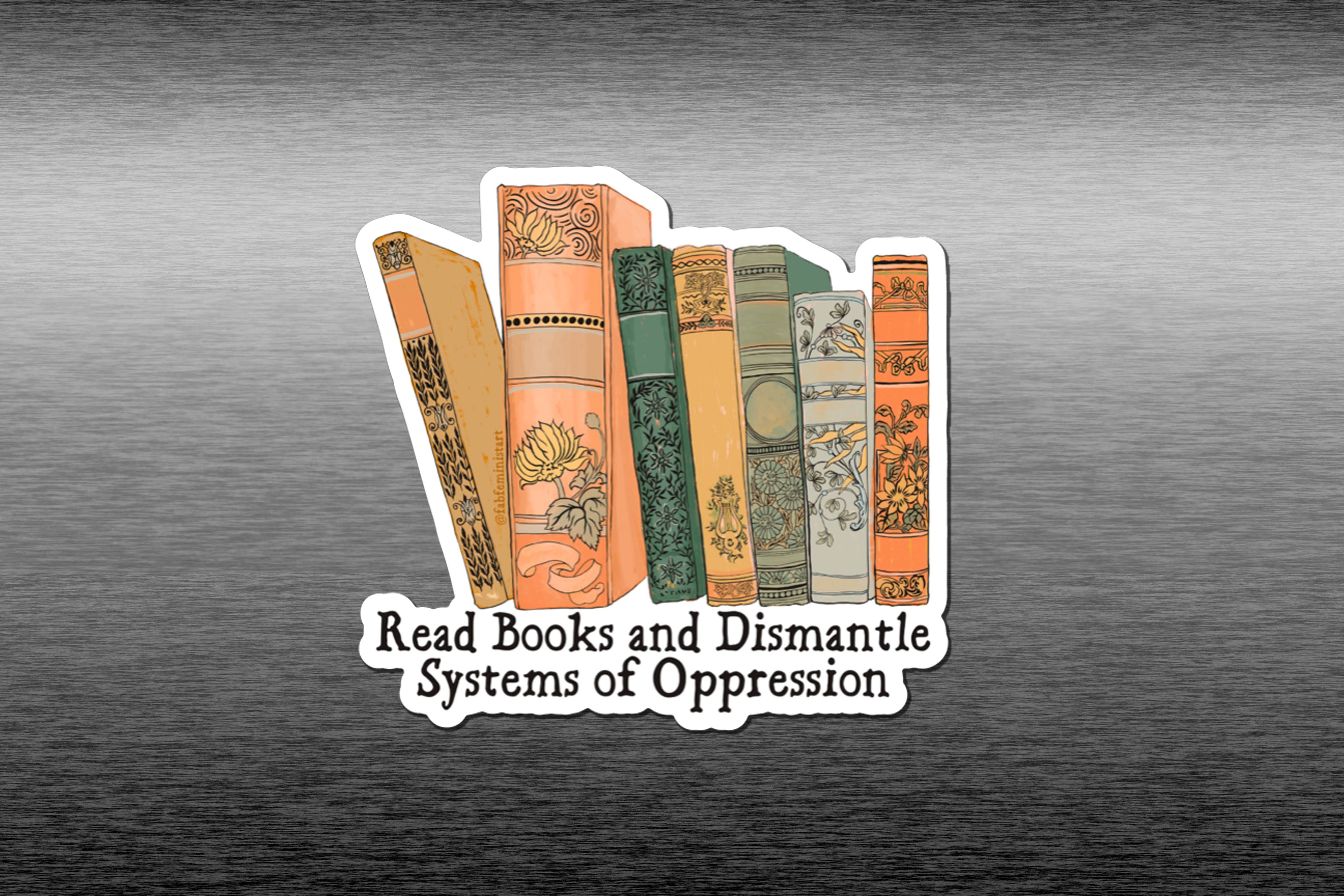 A magnet featuring a graphic of various books with the phrase 'Read Books and Dismantle Systems of Oppression' against a grey background.