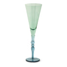 Green and blue glass flute on a white background
